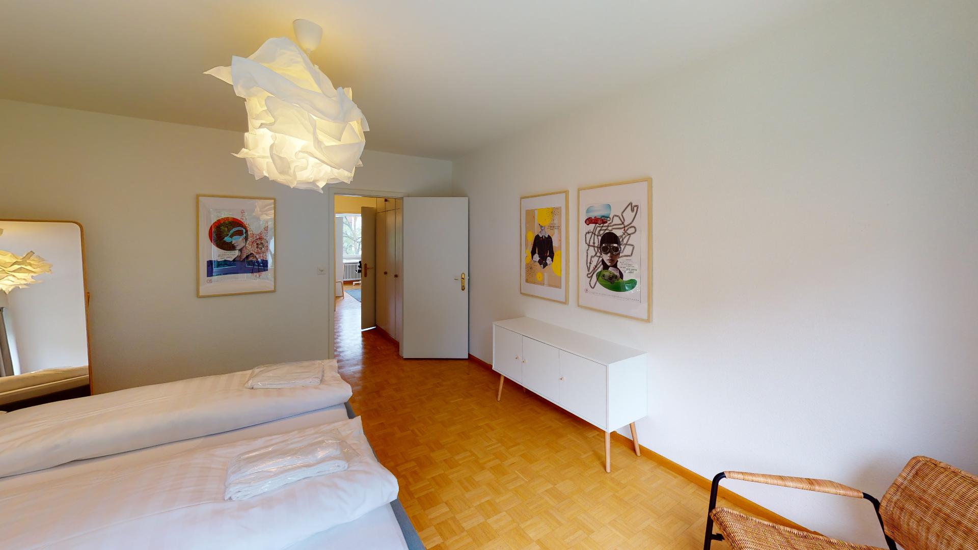 Unique-Serviced-Living-Aeschenplatz-Bedroom(1).jpg